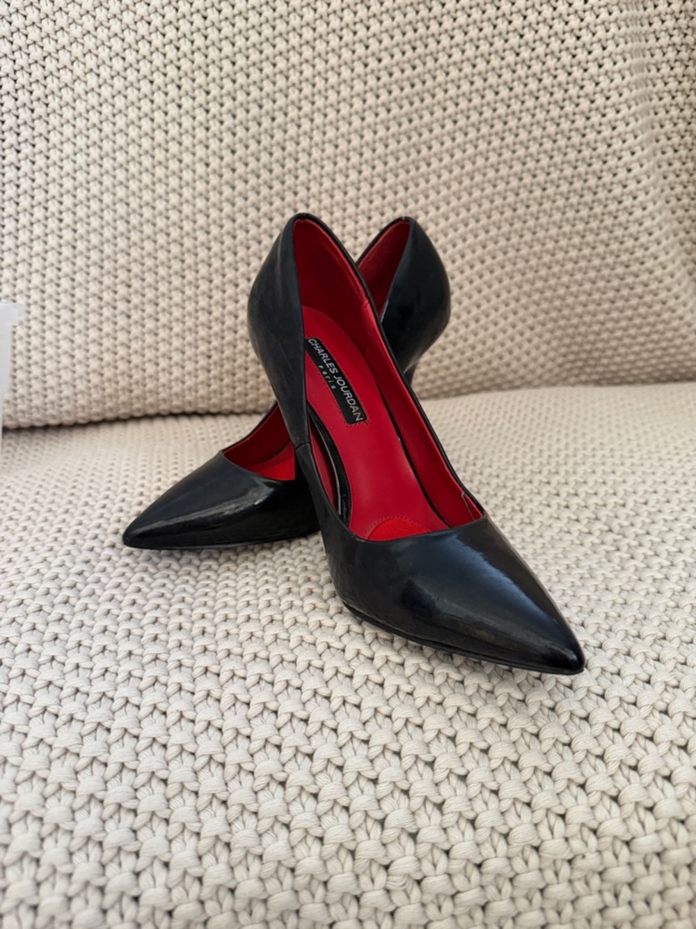 Black Patent Pointed-Toe Pumps with Red Lining